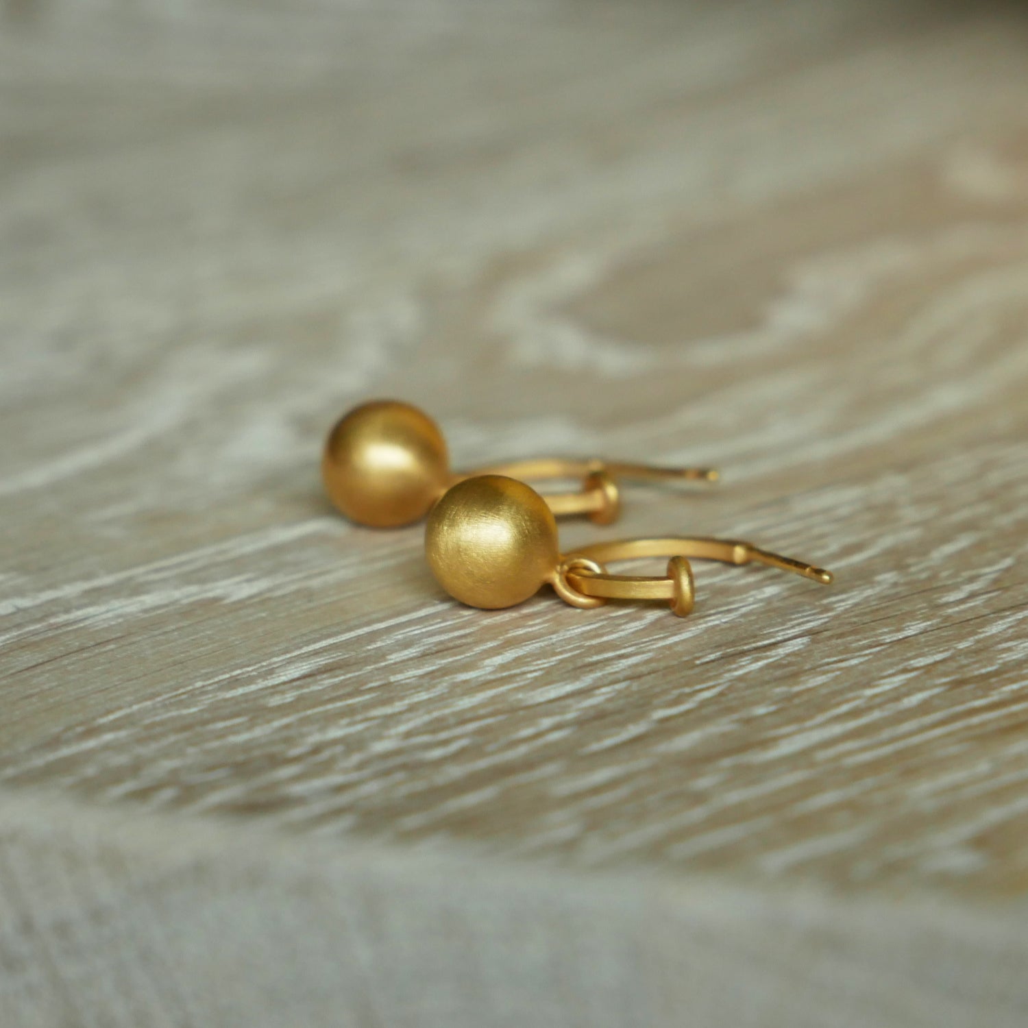 gold sphere hoop earrings