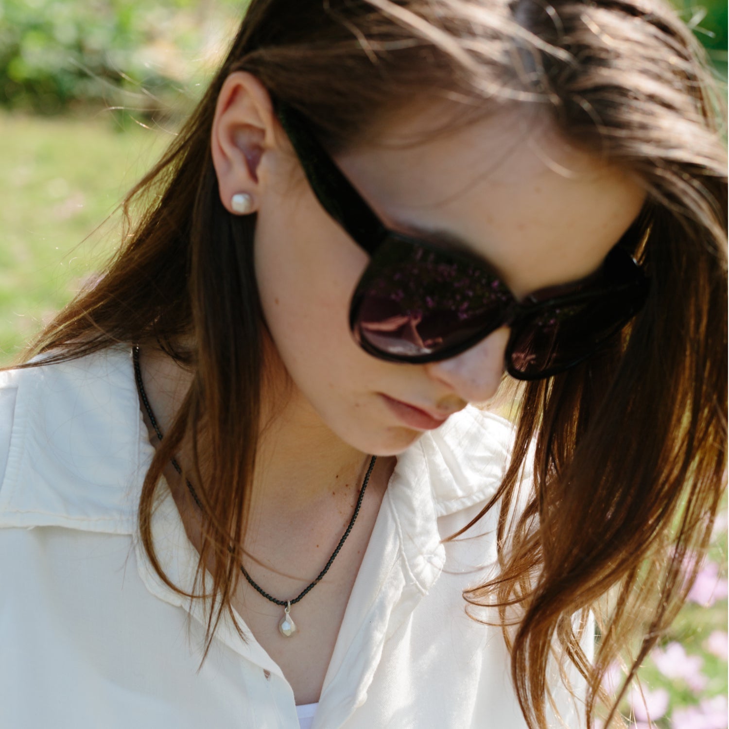 Haematite necklace with Flint charm