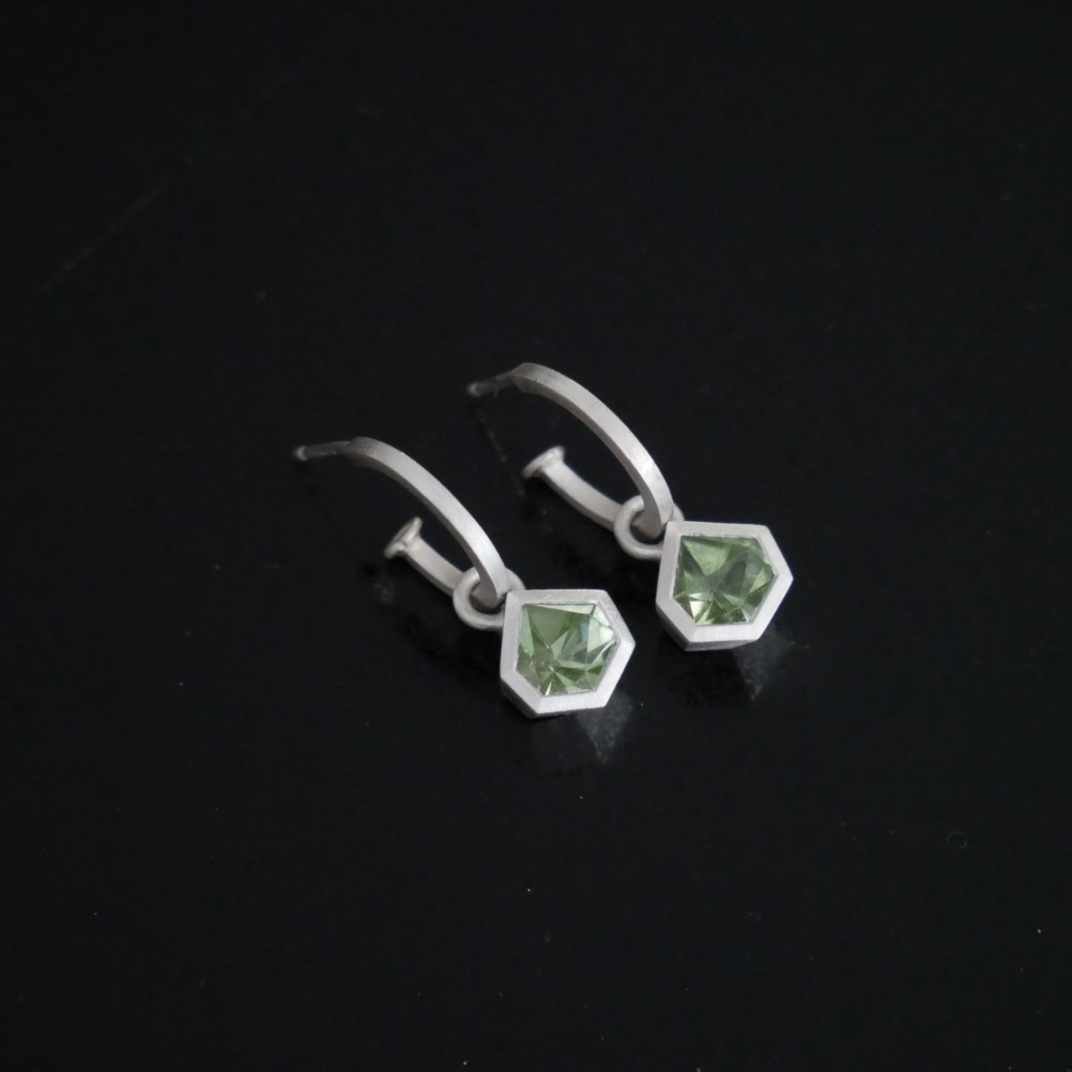 tiny hoops with set geometric peridot gemstones