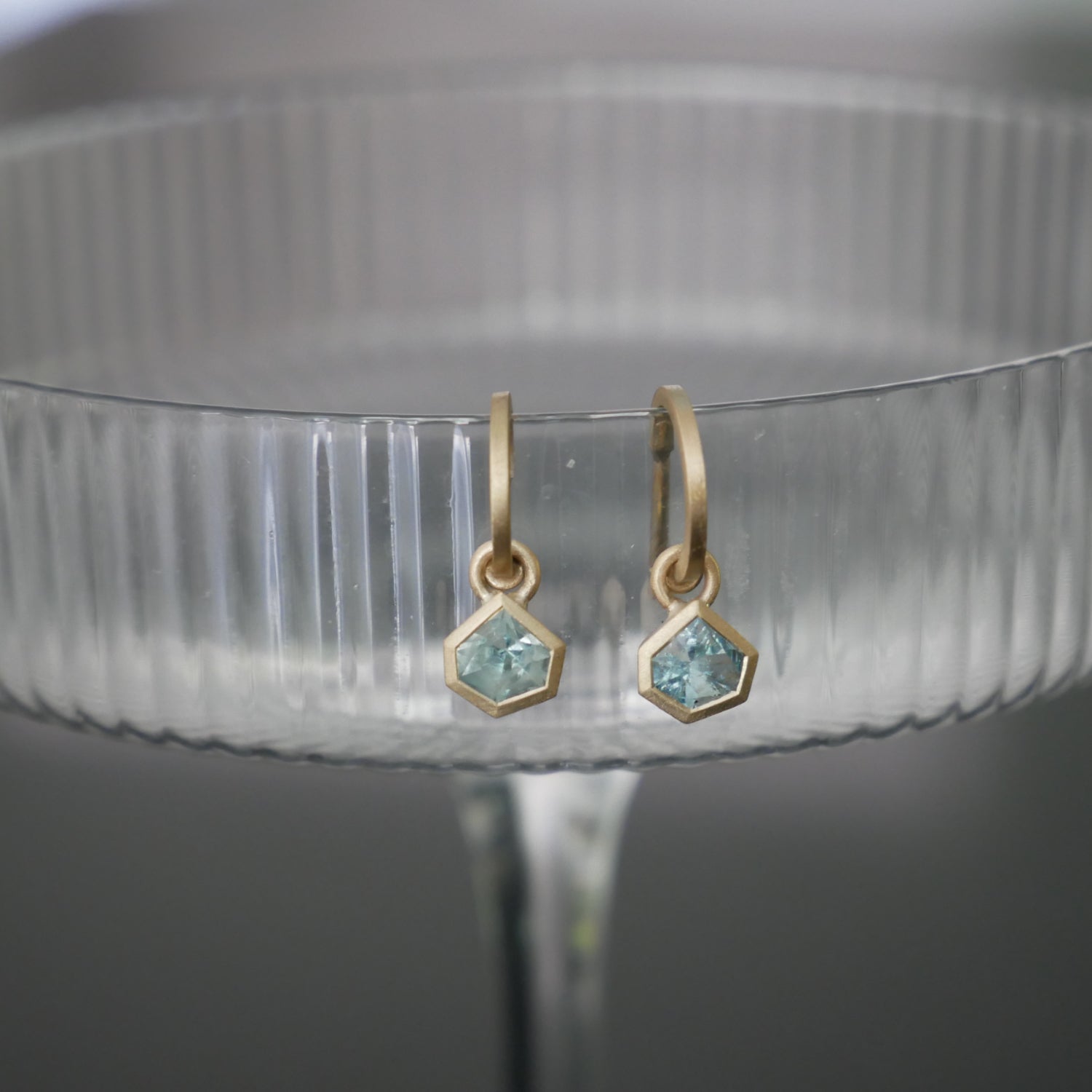 gold hoop and aquamarine earrings