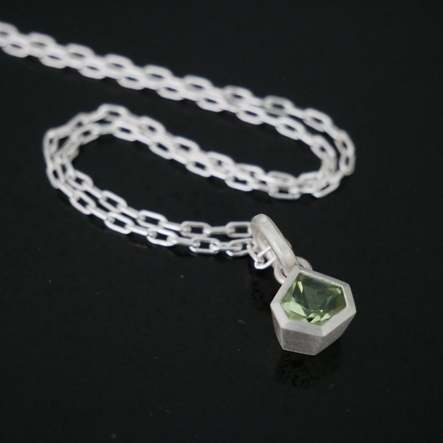 peridot geometric pendant