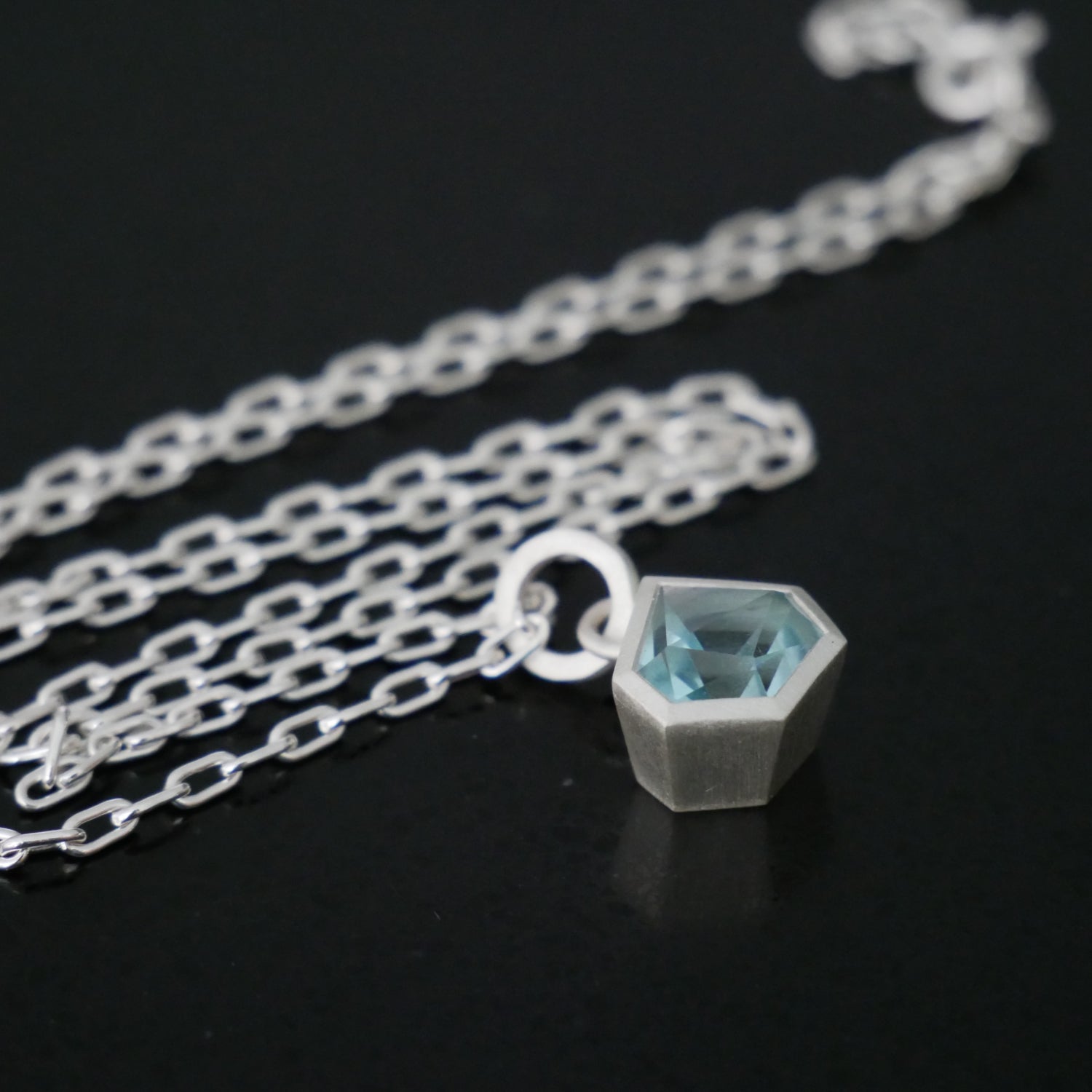 chunky Topaz geometric pendant on silver link chain
