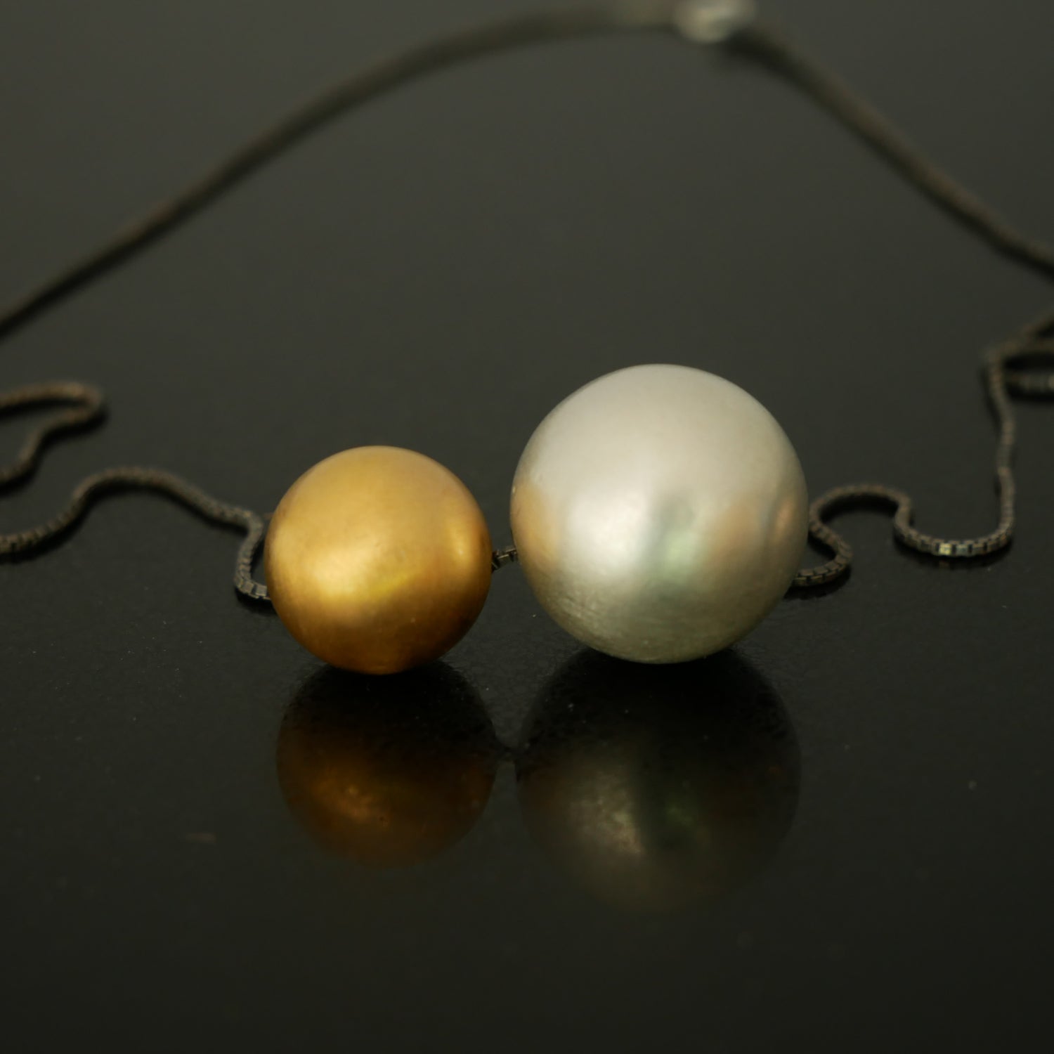 silver and gold ball necklace