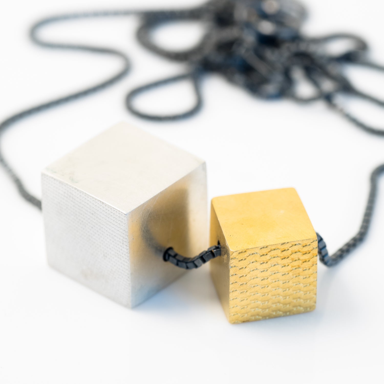 gold and silver cube necklace