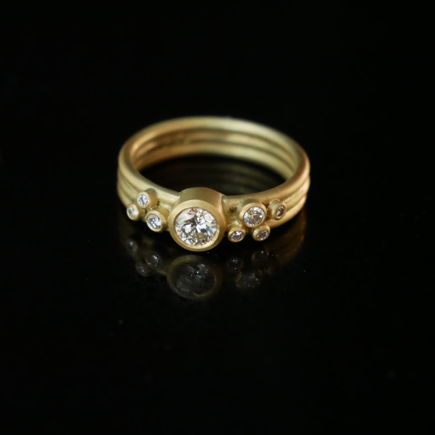 3 row 18ct gold ring with diamonds