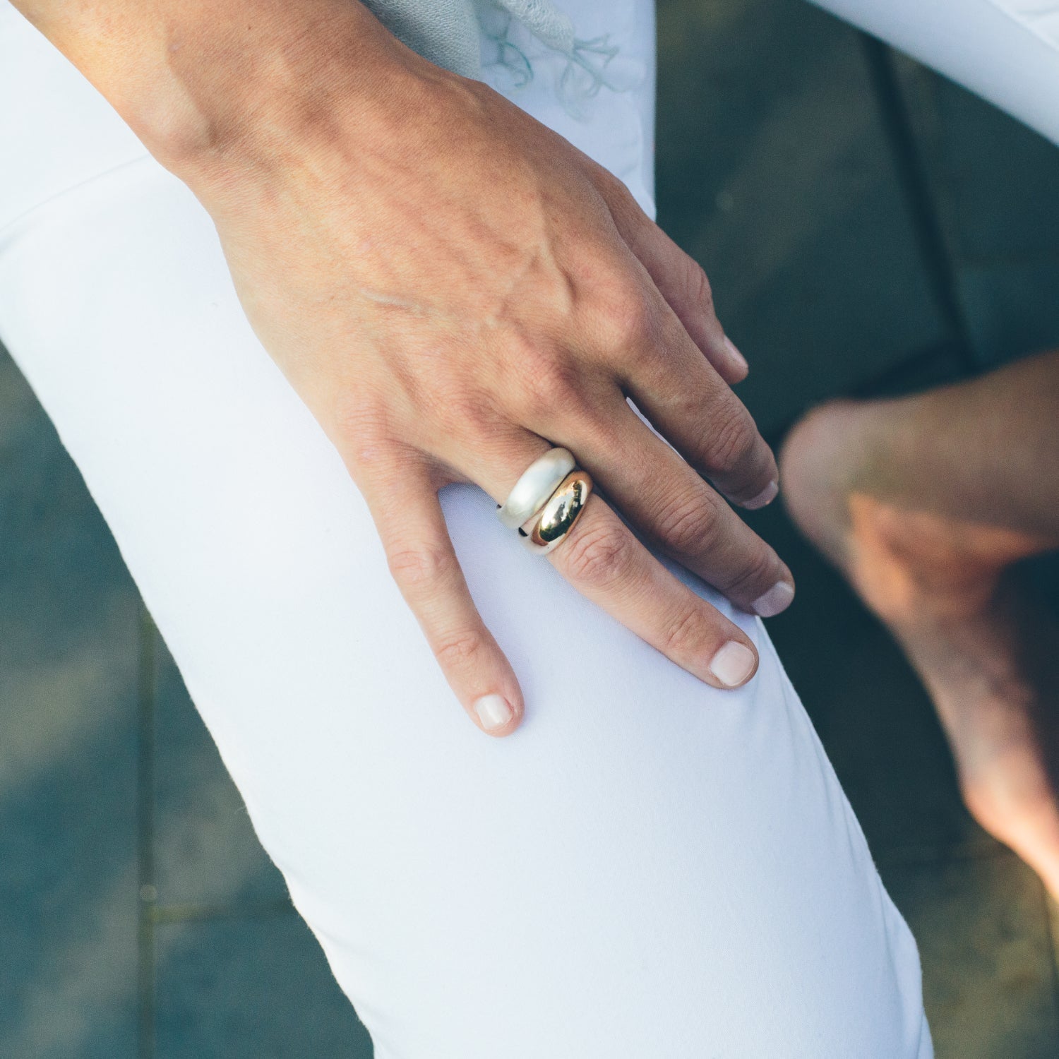 silver and gold wave rings