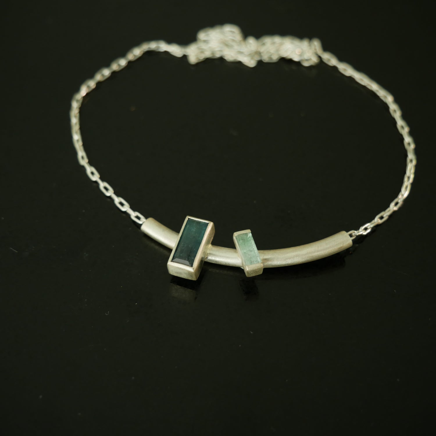 Double baguette stone silver pendant
