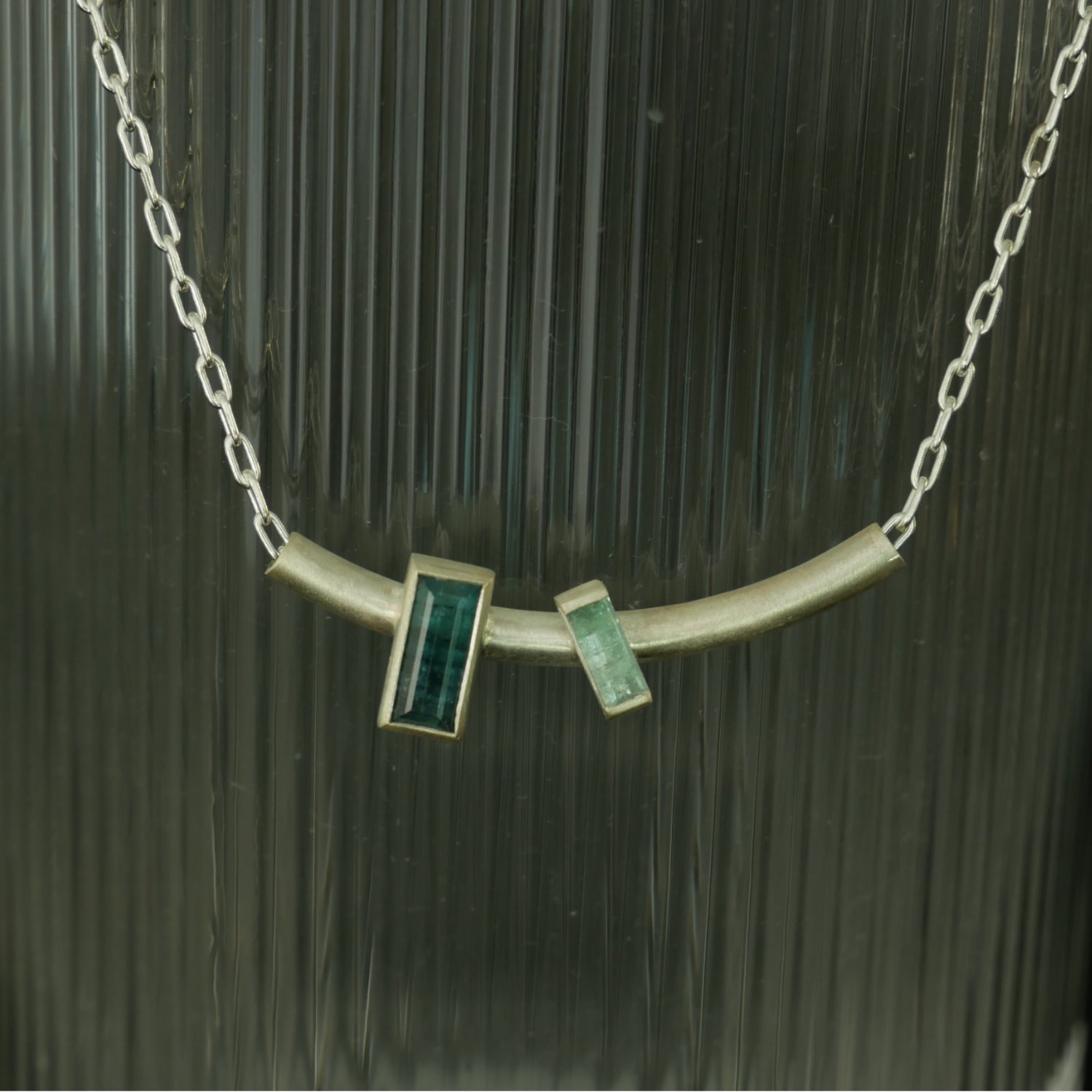 Double baguette stone silver pendant