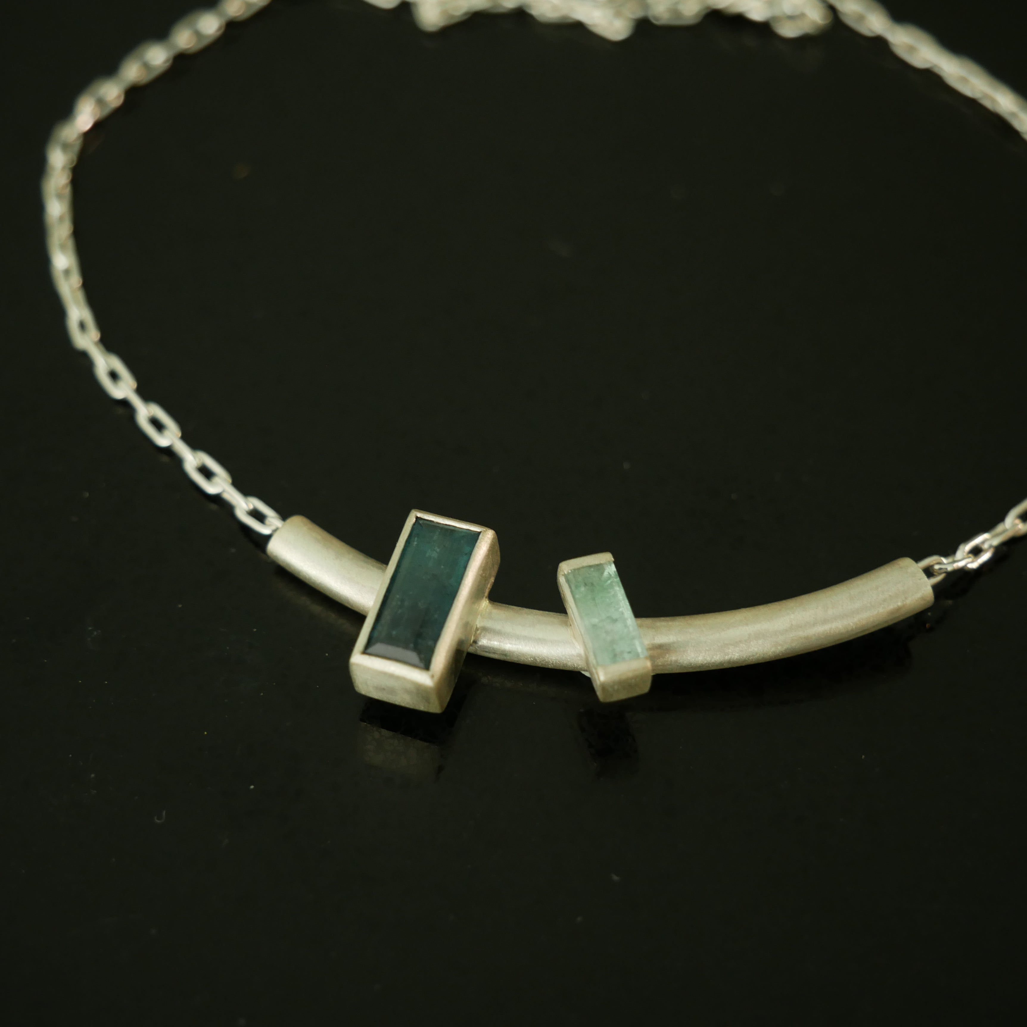 Double baguette stone silver pendant