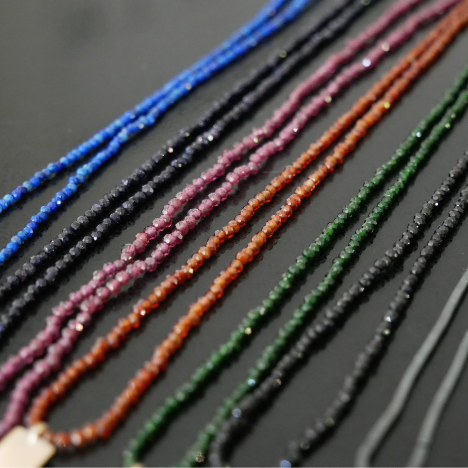 Delicate bead necklace with 9ct gold square