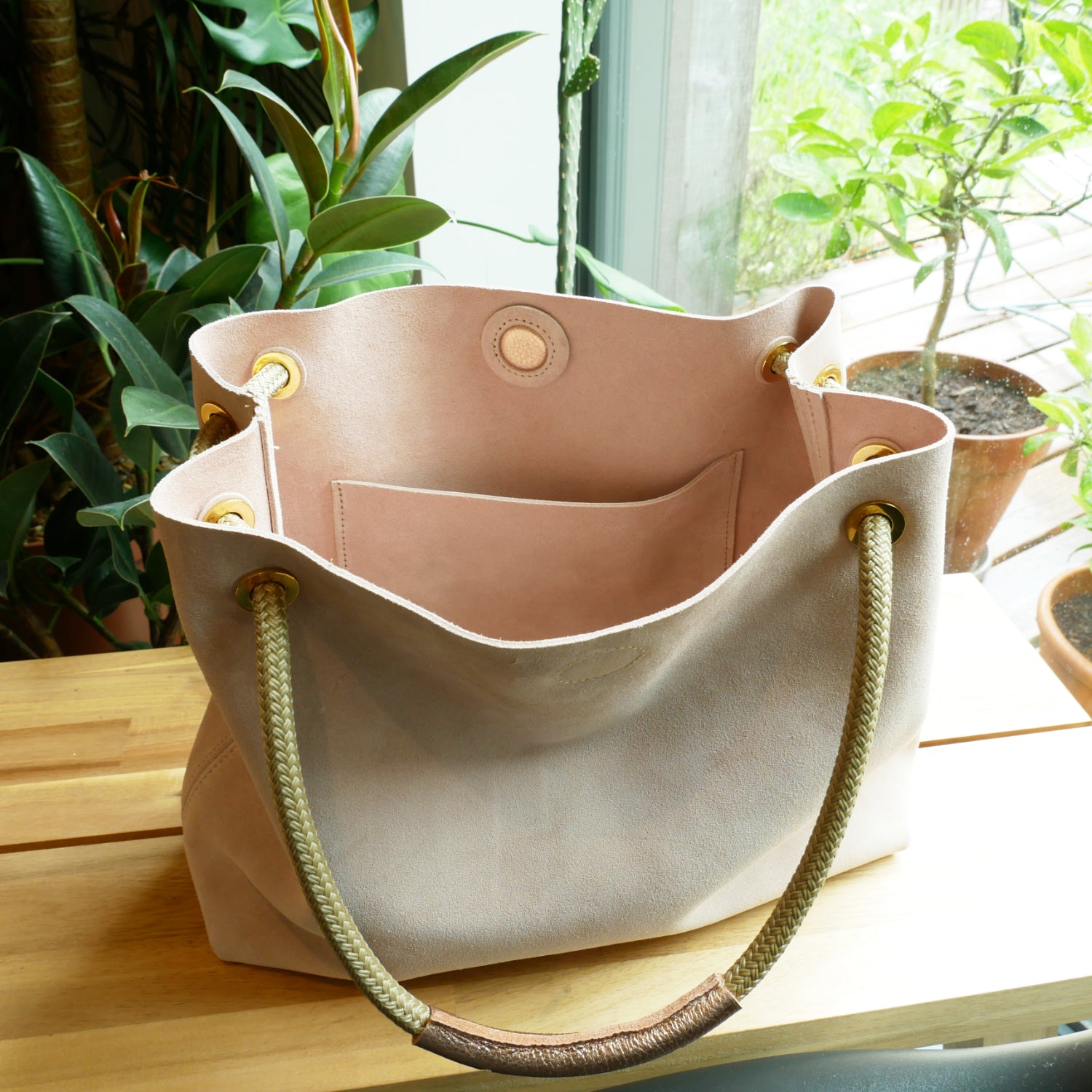 Pink suede should and rope cord bag