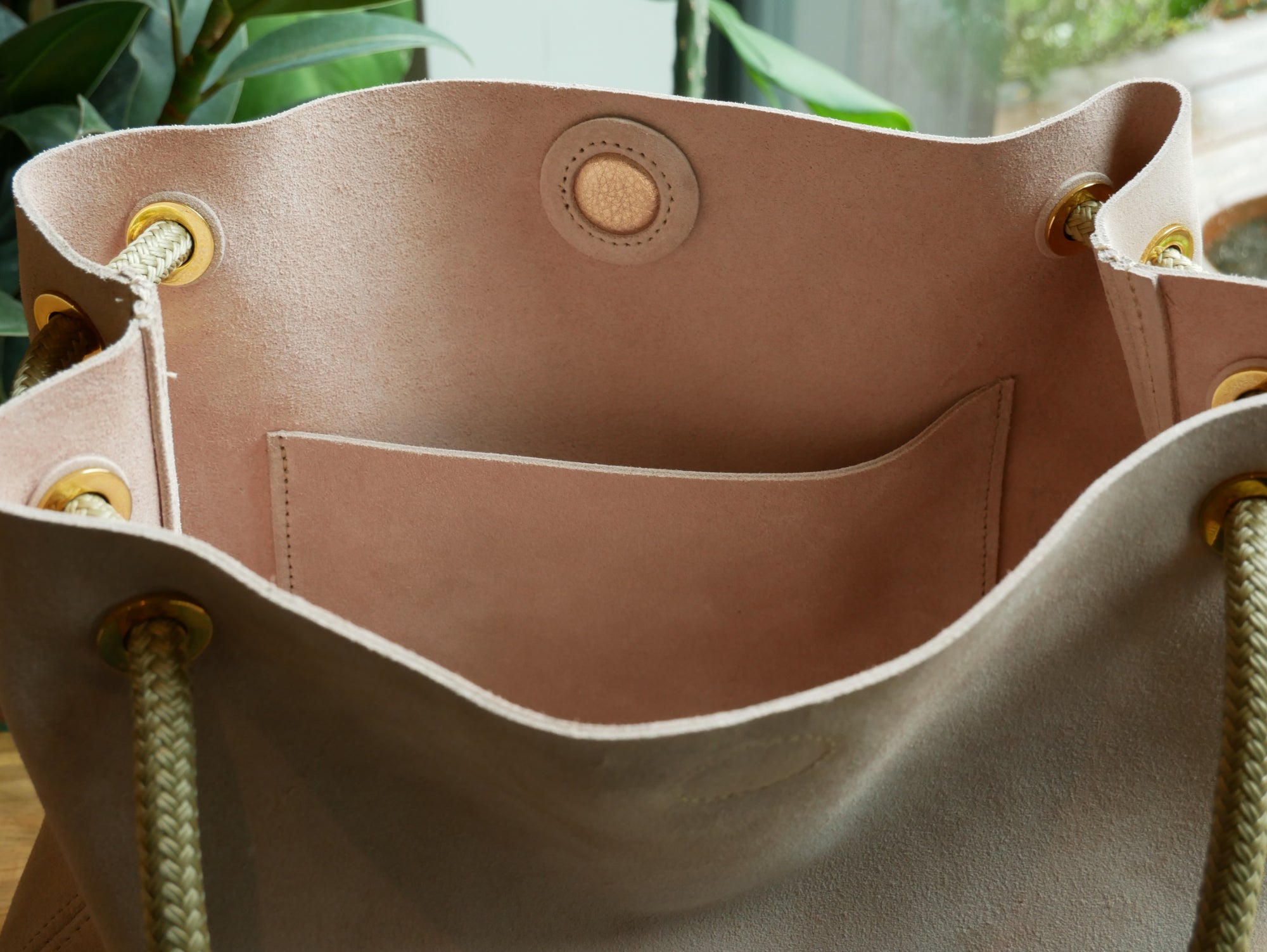 inside pink sutivan bag