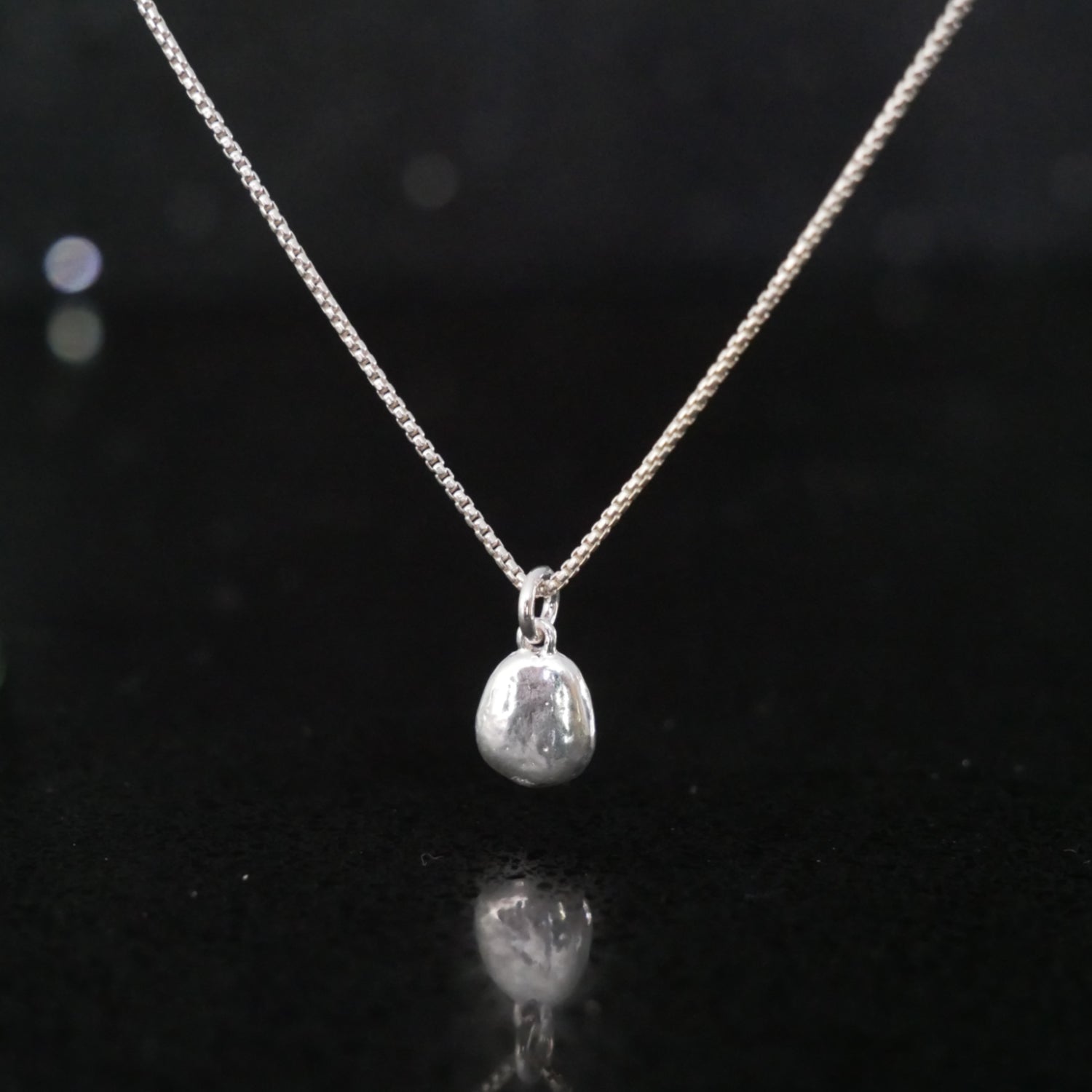 tiny silver pebble necklace