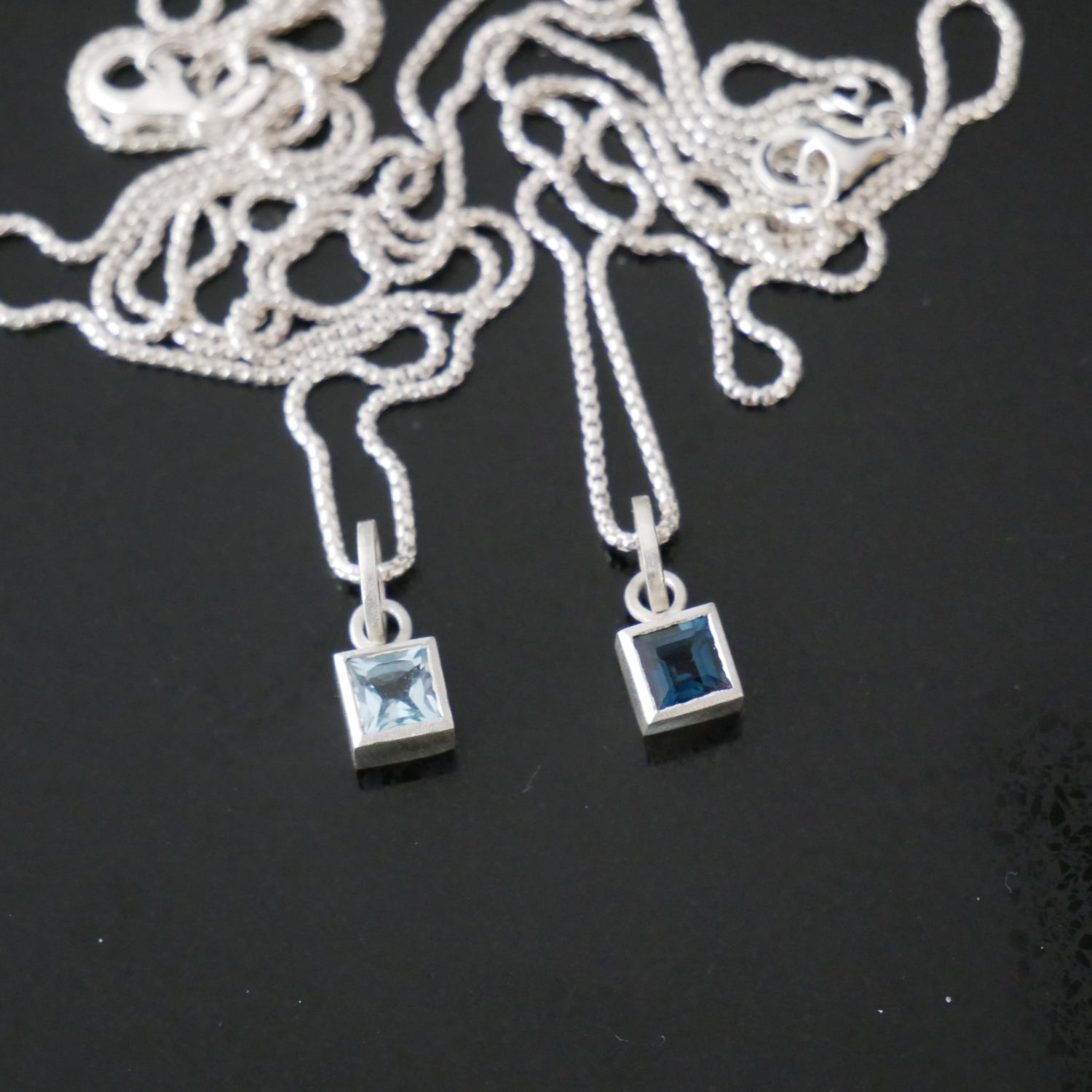 Silver topaz square necklace