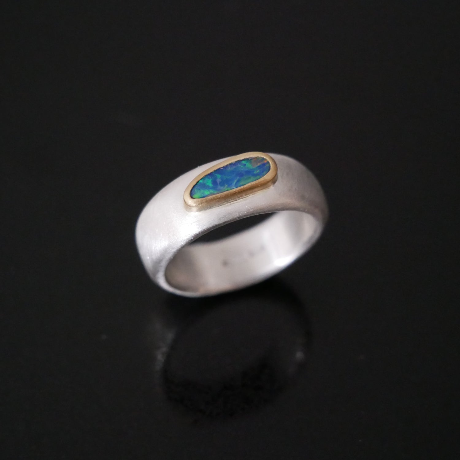 silver and gold wide ring with Opal