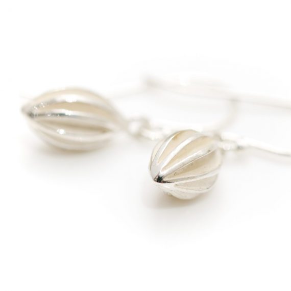 Tiny silver pod drop earrings