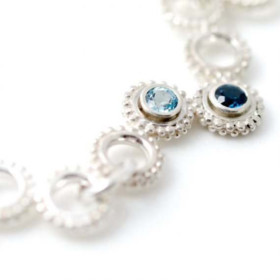 Statement beaded ring necklace with pale blue and London blue set Topaz