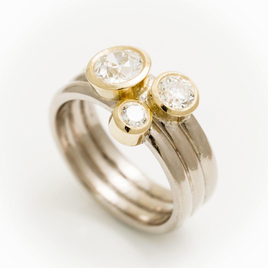18ct white and yellow gold ring with 3 diamonds