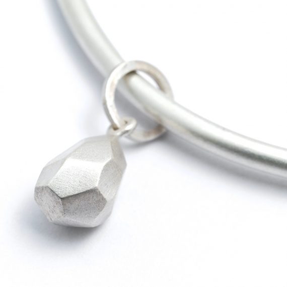 Silver plain bangle with Flint inspired charm