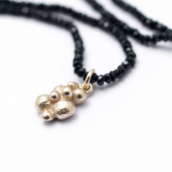 Black Spinel bead necklace with gold beaded charm