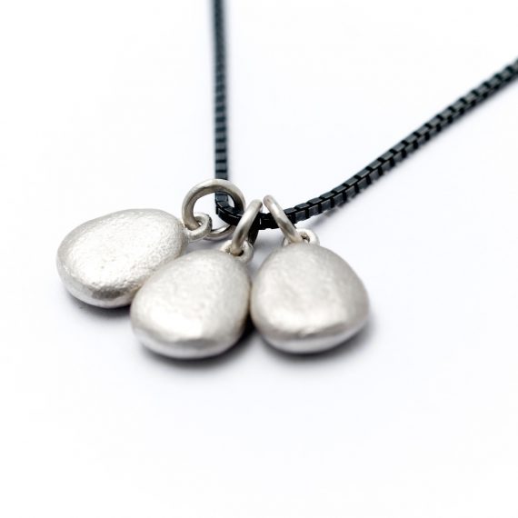 Personalised triple pebble necklace on silver oxidised chain