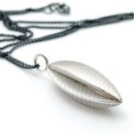 silver long seed pod necklace with oxidised silver chain
