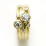 18ct yellow gold 5 band ring with scattered diamonds