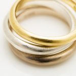 Stacking narrow wave rings in silver, 18ct yellow and 18ct white gold