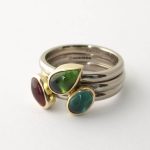 18ct white gold stacking rings with three different coloured cabochon Tourmalines