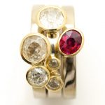 18ct white and yellow gold stacking rings with Diamonds and a Ruby