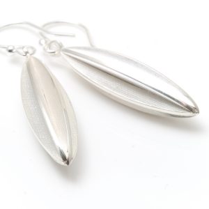Silver long pod drop earrings