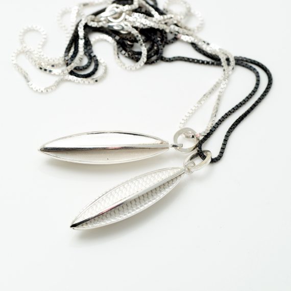 Silver textured pod necklace with oxydised or silver chain
