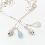 Tiny silver pod drop necklace with chalcedony and aquamarine