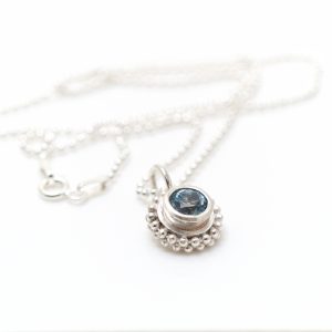 Simple silver beaded ring pendant with semi precious stone
