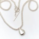 Silver Beaded necklace with chunky pebble drop