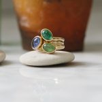 9ct gold stacking rings with garnet emerald and tanzanite