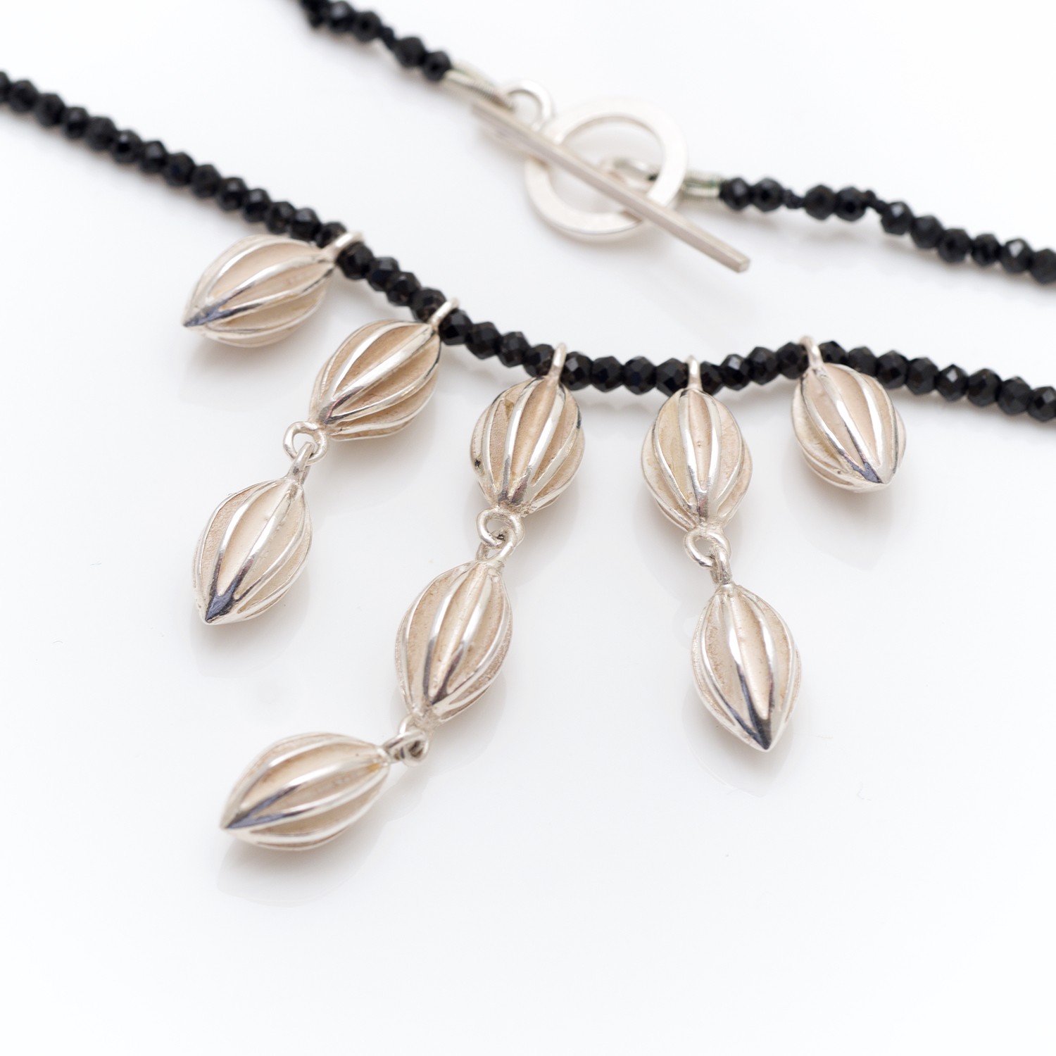 waterfall pod necklace with spinel