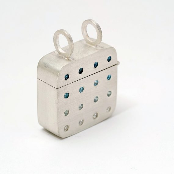 cushion shaped box pendant with topaz