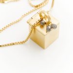 Gold vermeil box pendant with grey diamonds