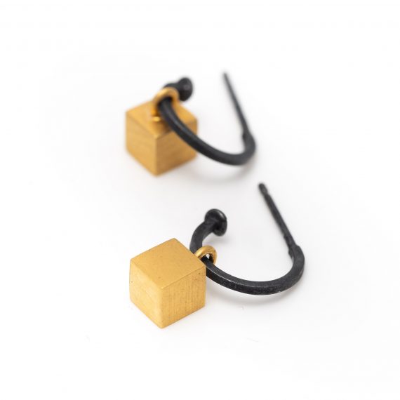 Silver oxidised hoop and gold cube earring