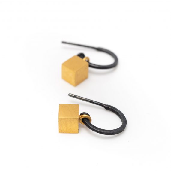 Silver oxidised hoop and gold cube earring