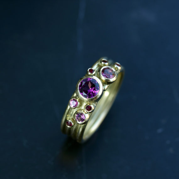 18ct gold ring with Rhodelite garnets and rubies