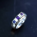Wide silver ring with 3 square stones