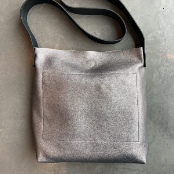 Soft metallic leather tote across body bag