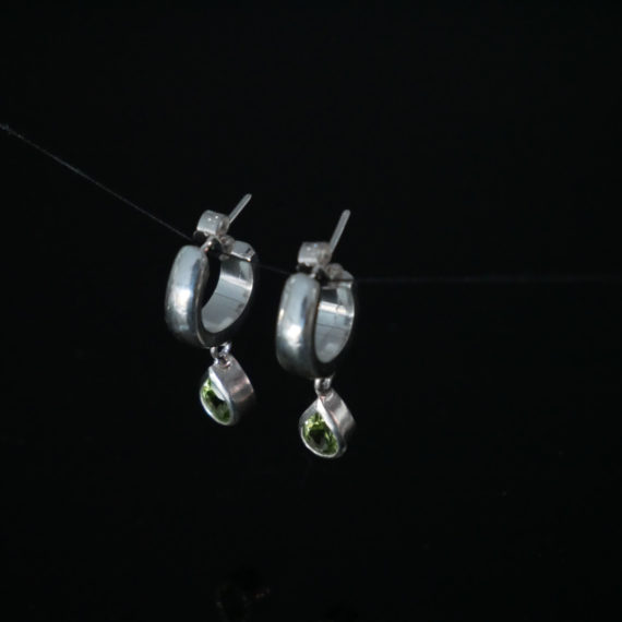 Chunky silver hoop with peridot drop