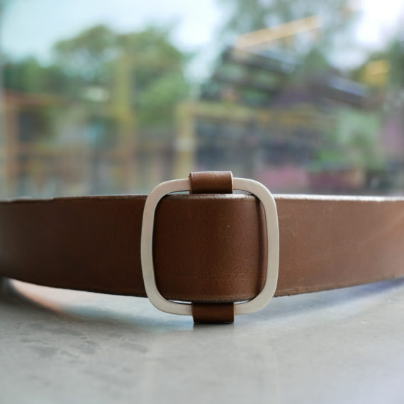 silver cushioned buckled belt