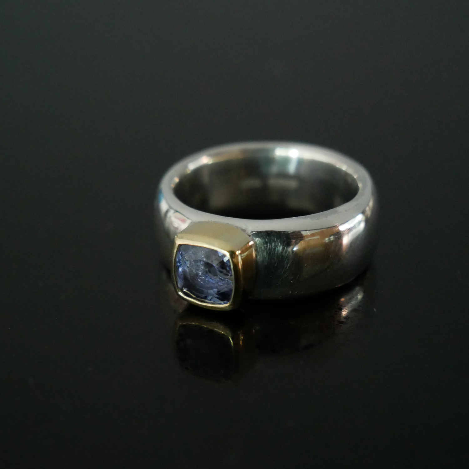 wide silver ring with Iolite