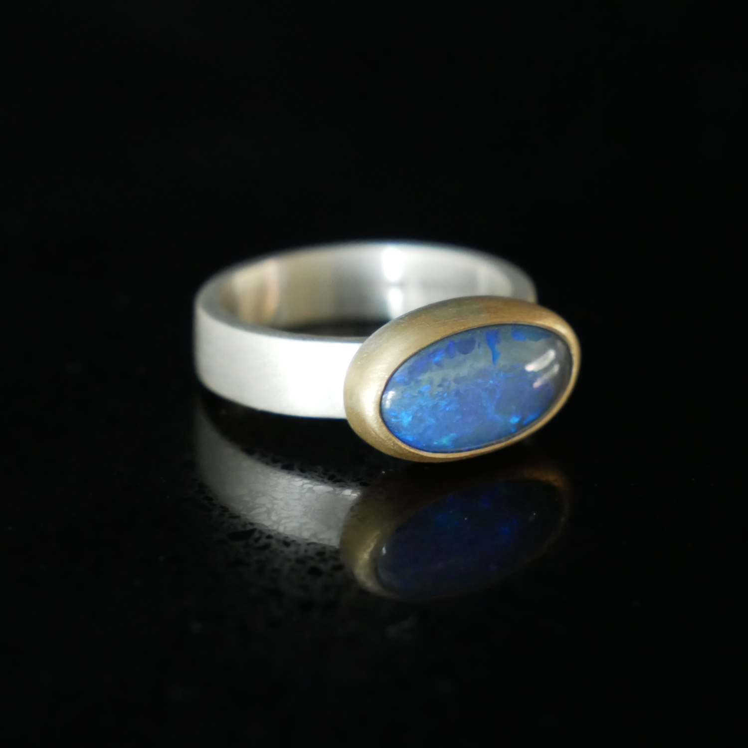Black opal silver and gold ring