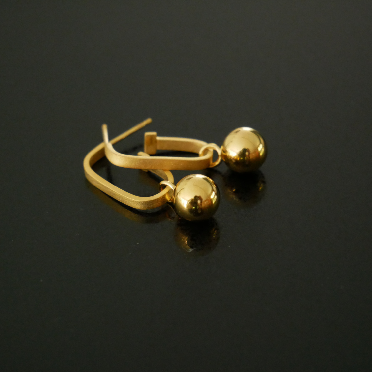 Gold vermeil hoop earrings with spheres